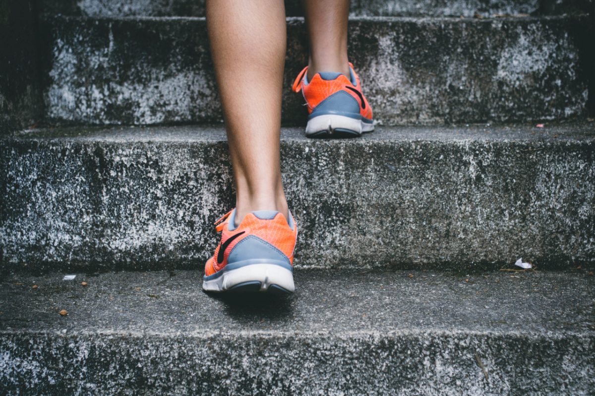 Close-up of someone walking up some steps