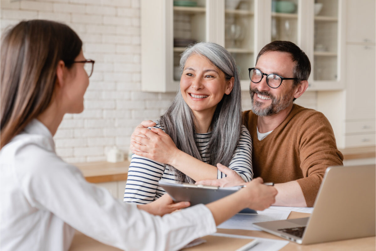 A couple meeting with a financial planner.