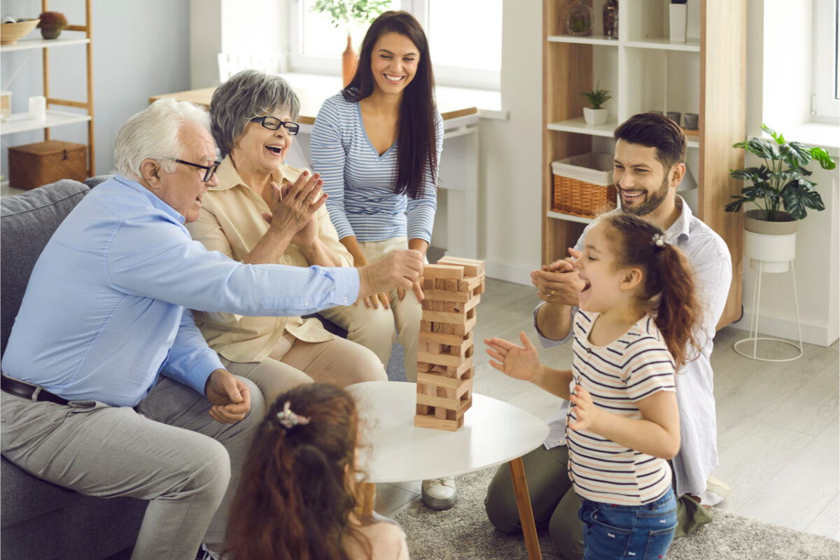 Grandparents playing a game with their grandchildren.