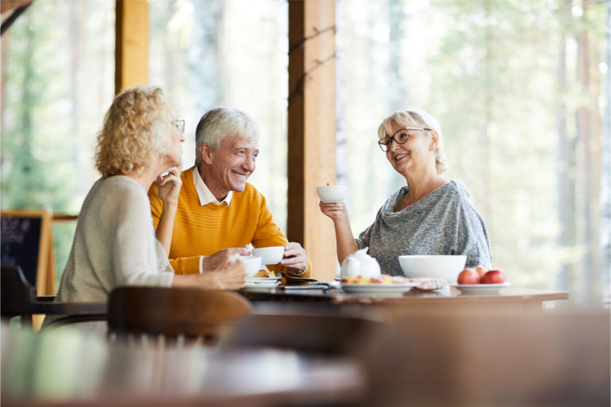 Group of friends talking over a cup of tea.