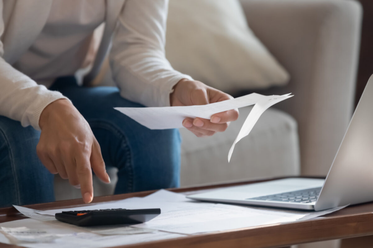 A person looking through paperwork.